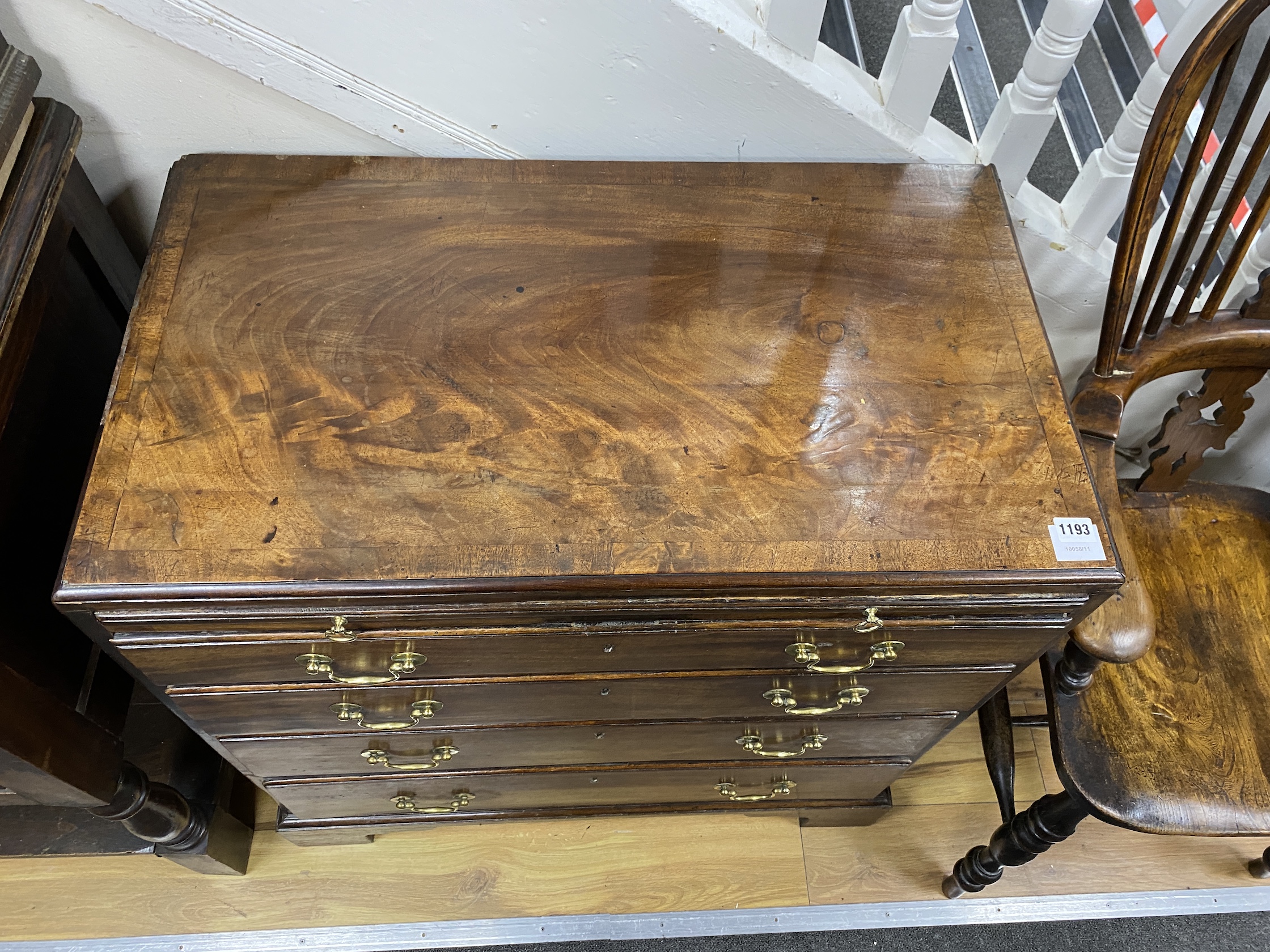 A small George III mahogany four drawer chest with brushing slide, width 86cm, depth 49cm, height 84cm